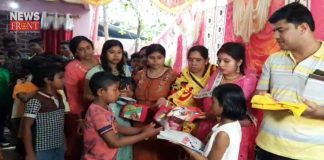 newly couple distribute food and clothes on marriage | newsfront.co