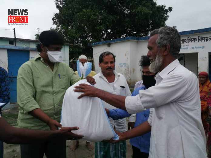 tmc leader distributes food | newsfront.co