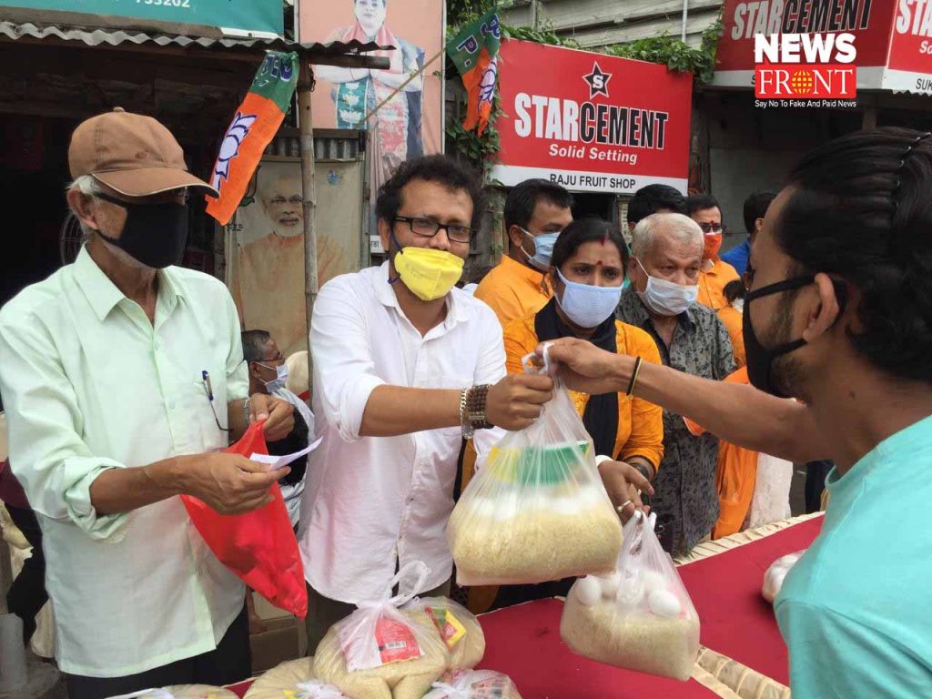 bjp leader distribute food to taxi driver | newsfront.co