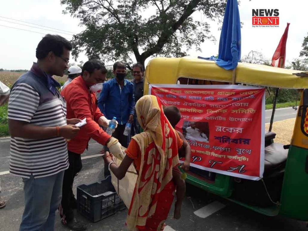 teacher distribute food to Miserable | newsfront.co